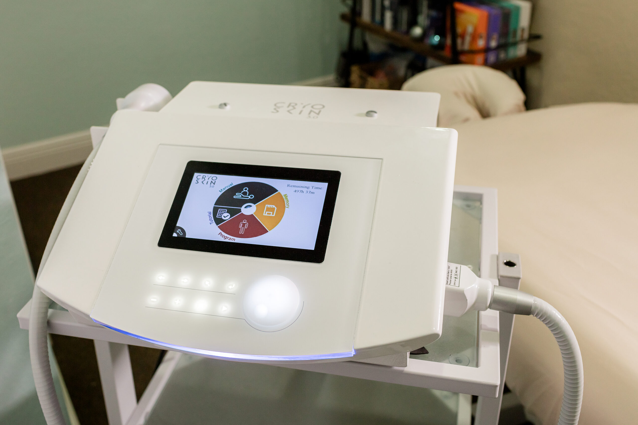 Close-up of a cryotherapy machine, designed to deliver cold therapy for pain relief and muscle recovery. The sleek, modern equipment features a chamber where individuals can sit while being exposed to cold temperatures for therapeutic benefits.