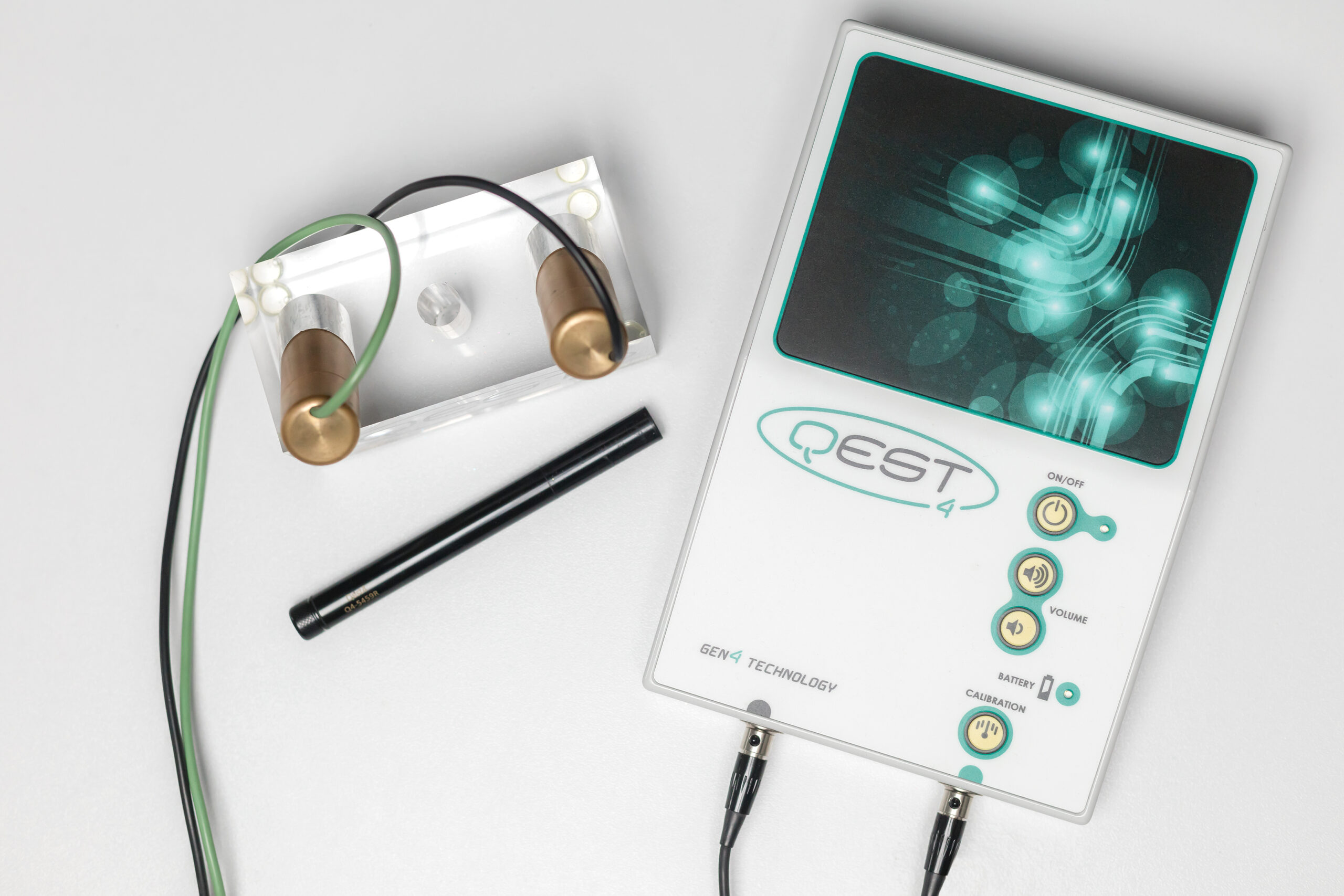 Close-up of the Qest4 biofeedback machine, a device used for advanced wellness assessments and personalized health optimization. The machine features a sleek interface with various sensors and displays, helping practitioners evaluate the body’s energy patterns and detect imbalances.